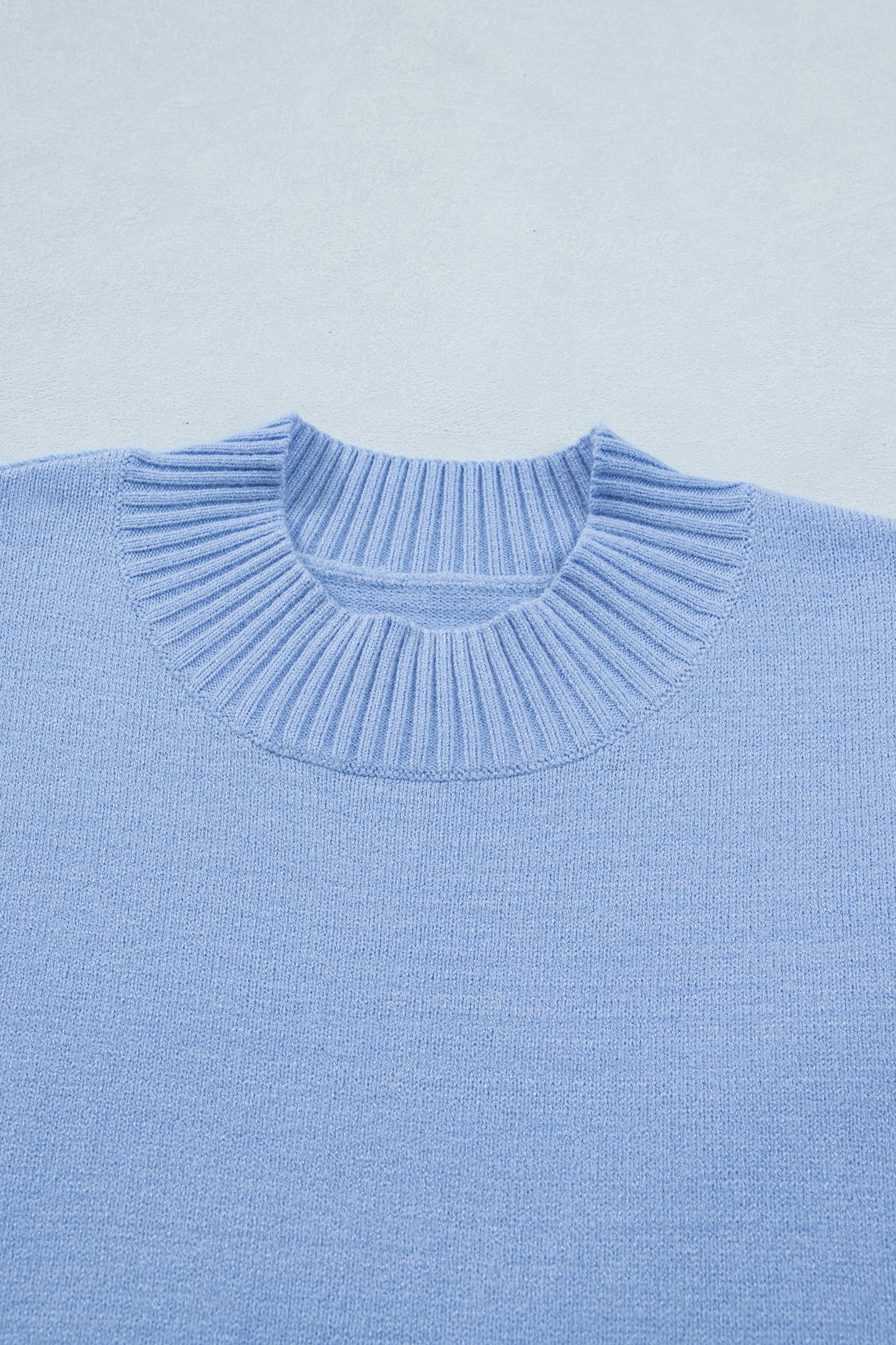 Beau Blue Solid Color Ribbed Trim Round Neck Ruffle Short Sleeve Sweater