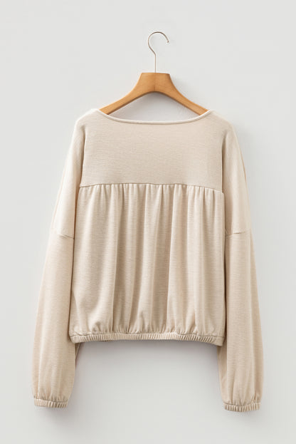 Jet Stream Textured Pleated Drop Shoulder Long Sleeve Knit Top